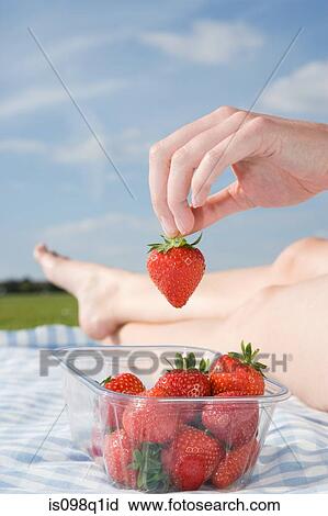Person with strawberry View Large Photo Image Stock Image - Person with strawberry. Fotosearch