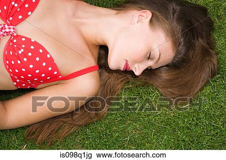 Young woman in bikini top View Large Photo Image Stock Image - Young woman in bikini top. Fotosearch