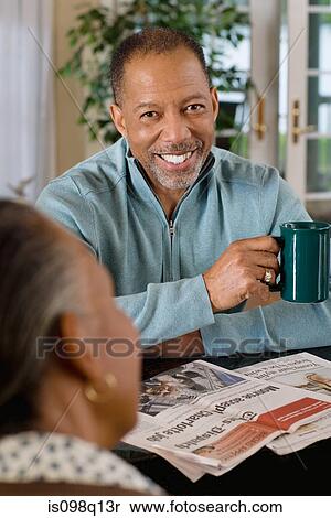 A senior couple in the kitchen View Large Photo Image Stock Photography - A senior couple in the kitchen. Fotosearch