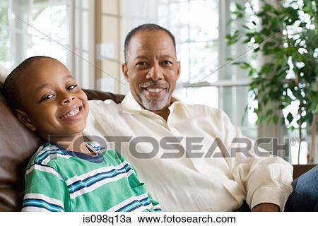 Stock Image - Portrait of a grandfather and grandson. Fotosearch