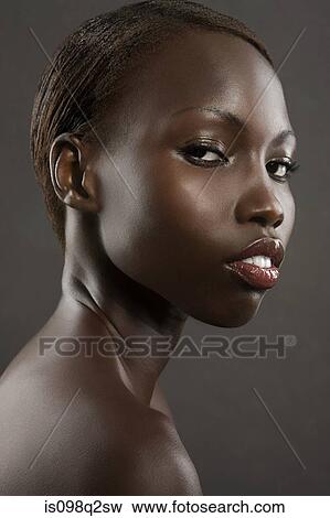 Stock Photo - Portrait of a young woman. Fotosearch