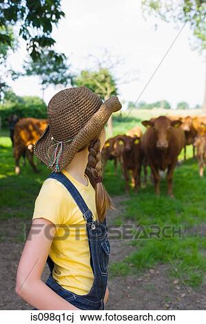 A girl on a farm View Large Photo Image Stock Image - A girl on a farm. Fotosearch