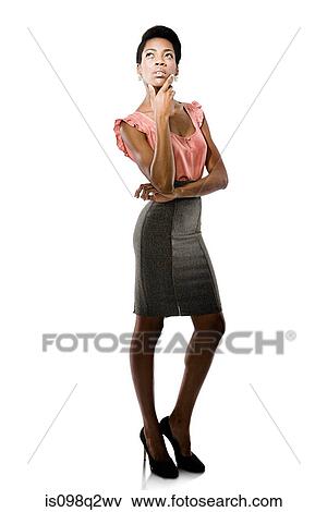 Portrait of a young woman thinking View Large Photo Image Stock Photo - Portrait of a young woman thinking. Fotosearch
