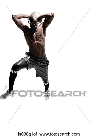 A young man playing basketball View Large Photo Image Stock Image - A young man playing basketball. Fotosearch