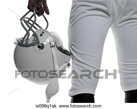 American football player holding a helmet View Large Photo Image Stock Image - American football player holding a helmet. Fotosearch