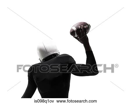 An american football player holding a football View Large Photo Image Stock Photo - An american football player holding a football. Fotosearch