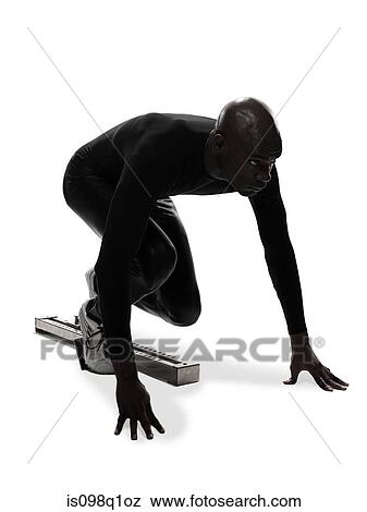 Athlete on starting blocks View Large Photo Image Stock Photo - Athlete on starting blocks. Fotosearch