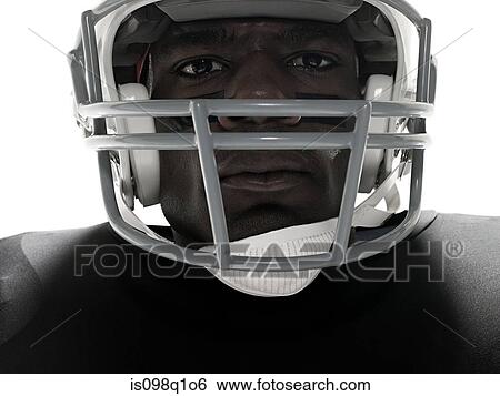 Stock Photograph - Close up of an american football player. Fotosearch
