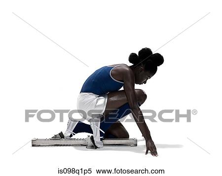 Young woman at starting blocks View Large Photo Image Stock Photography - Young woman at starting blocks. Fotosearch