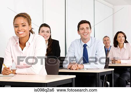 Business students in a lesson View Large Photo Image Stock Photograph - Business students in a lesson. Fotosearch