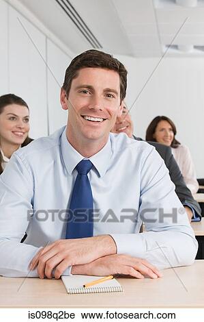 Portrait of a businessman in a lesson View Large Photo Image Stock Image - Portrait of a businessman in a lesson. Fotosearch