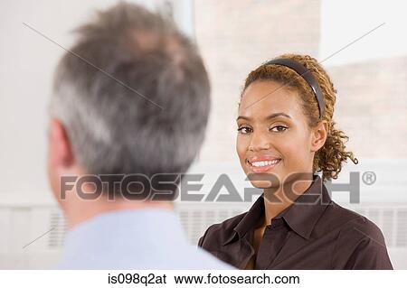 Portrait of a young woman in a lesson View Large Photo Image Stock Photograph - Portrait of a young woman in a lesson. Fotosearch