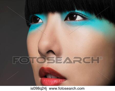 Woman with turquoise eyeshadow View Large Photo Image Stock Image - Woman with turquoise eyeshadow. Fotosearch