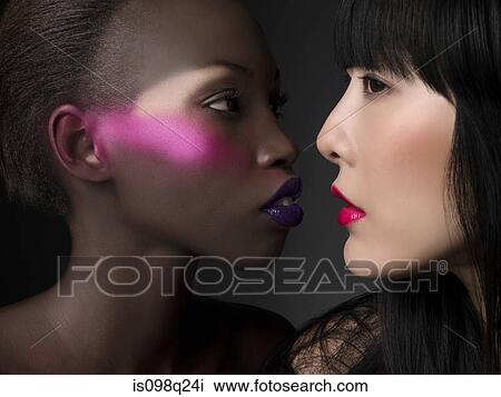 Women with bright makeup View Large Photo Image Stock Image - Women with bright makeup. Fotosearch