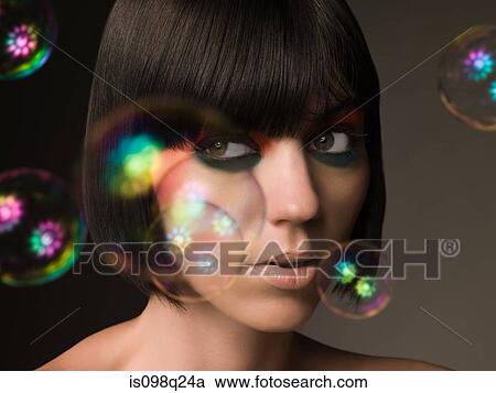 Young woman and bubbles View Large Photo Image Stock Image - Young woman and bubbles. Fotosearch