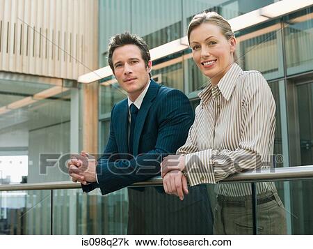 Stock Image - Businesswoman and businessman. Fotosearch