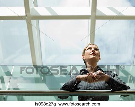 Businesswoman looking up View Large Photo Image Stock Image - Businesswoman looking up. Fotosearch