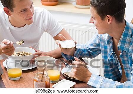 A gay couple having breakfast View Large Photo Image Stock Photograph - A gay couple having breakfast. Fotosearch