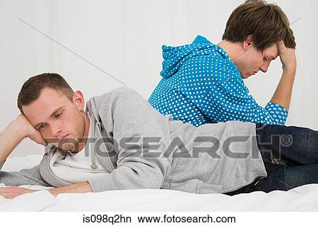 A gay couple having relationship difficulties View Large Photo Image Picture - A gay couple having relationship difficulties. Fotosearch