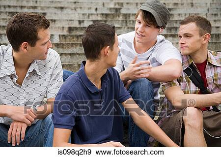 Friends talking View Large Photo Image Stock Photo - Friends talking. Fotosearch