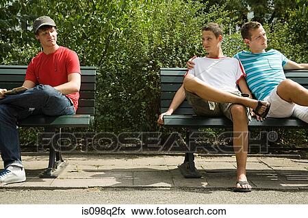 Two men looking at each other View Large Photo Image Stock Photo - Two men looking at each other. Fotosearch