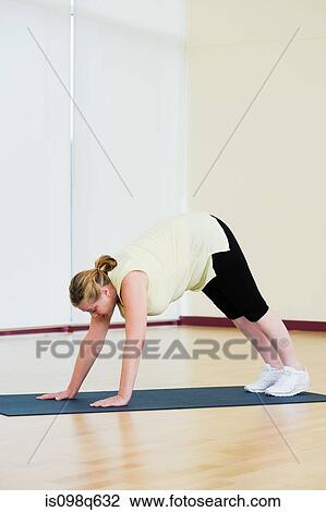 Mature woman doing yoga View Large Photo Image Stock Image - Mature woman doing yoga. Fotosearch