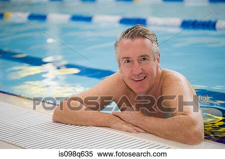 Portrait of a man in a swimming pool View Large Photo Image Stock Photography - Portrait of a man in a swimming pool. Fotosearch