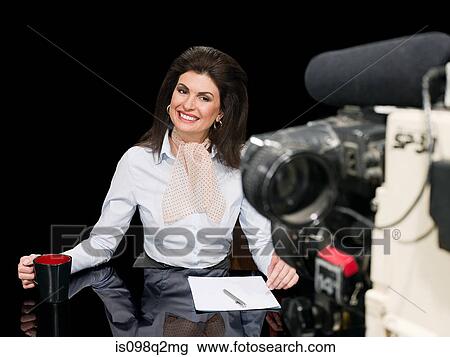News presenter and camera View Large Photo Image Stock Image - News presenter and camera. Fotosearch