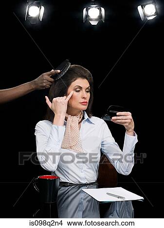 News presenter getting ready View Large Photo Image Picture - News presenter getting ready. Fotosearch