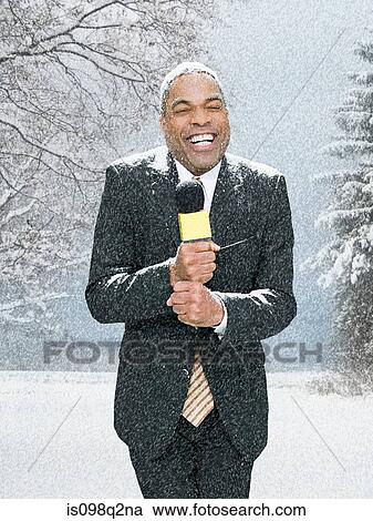 News presenter in snow View Large Photo Image Stock Image - News presenter in snow. Fotosearch