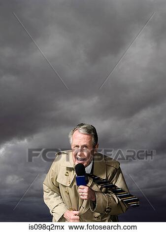 News presenter in storm View Large Photo Image Stock Photo - News presenter in storm. Fotosearch
