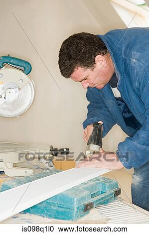 A carpenter using a sander View Large Photo Image Stock Image - A carpenter using a sander. Fotosearch