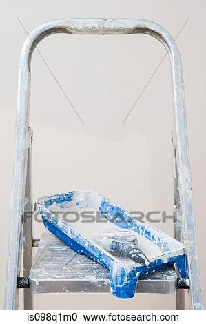 Stock Image - Ladder and a tray of paint. Fotosearch