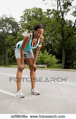Stock Image - Exhausted runner. Fotosearch