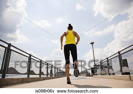 Stock Photo - Female runner. Fotosearch