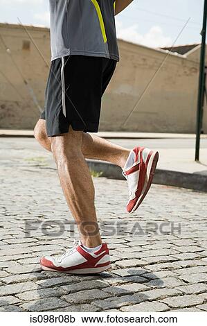 Legs of a runner View Large Photo Image Stock Image - Legs of a runner. Fotosearch