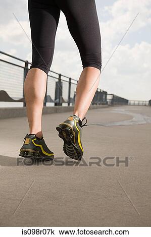 Stock Image - Legs of runner. Fotosearch