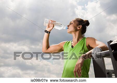 Runner drinking View Large Photo Image Stock Image - Runner drinking. Fotosearch