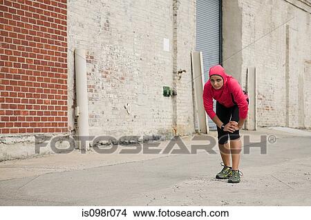 Runner in urban setting View Large Photo Image Picture - Runner in urban setting. Fotosearch