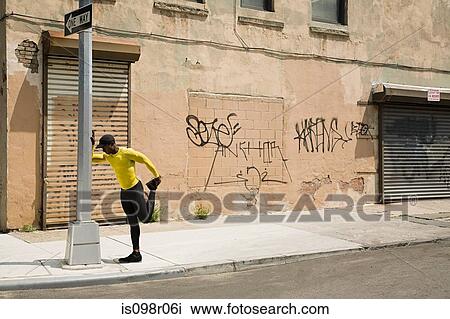 Runner stretching View Large Photo Image Stock Image - Runner stretching. Fotosearch