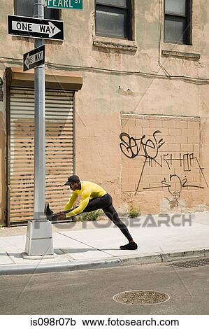 Runner stretching View Large Photo Image Stock Image - Runner stretching. Fotosearch