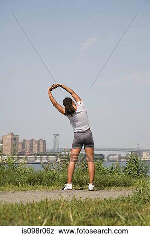 Runner stretching View Large Photo Image Stock Photo - Runner stretching. Fotosearch