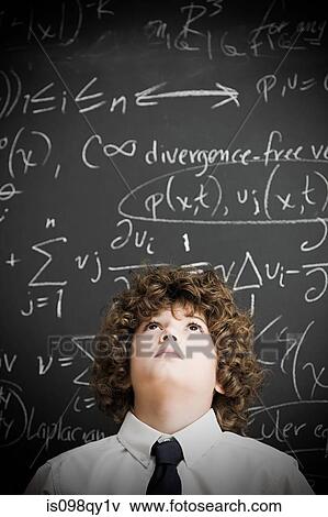 Stock Photo - Boy and blackboard. Fotosearch