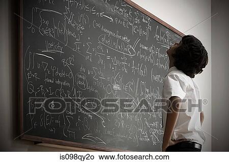 Boy by blackboard View Large Photo Image Picture - Boy by blackboard. Fotosearch