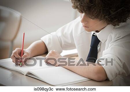 Boy in classroom View Large Photo Image Stock Image - Boy in classroom. Fotosearch