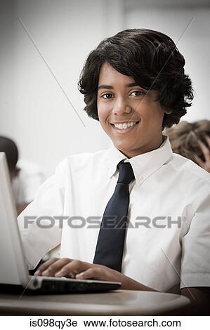 Boy in classroom View Large Photo Image Stock Image - Boy in classroom. Fotosearch