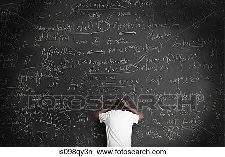 Boy with formulae on blackboard View Large Photo Image Picture - Boy with formulae on blackboard. Fotosearch