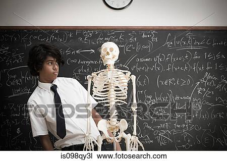 Boy with skeleton View Large Photo Image Stock Image - Boy with skeleton. Fotosearch