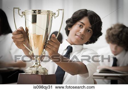 Boy with trophy View Large Photo Image Stock Image - Boy with trophy. Fotosearch