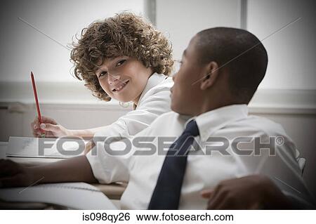 Stock Photograph - Boys in classroom. Fotosearch